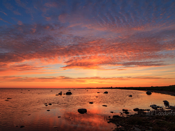  Päikeseloojang rannas